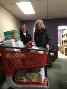 Julie and Brenda delivering the diapers collected by St. Matthew Lutheran Church